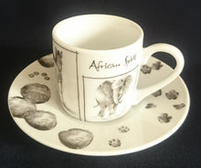 Lade das Bild in den Galerie-Viewer, 2er ESPRESSO KAFFEEGEDECK &quot;African Spirit&quot; - Porzellan, African Spirit Aufschrift Fauna Tierspuren Zebra Giraffe Nashorn Löwe Elefant Motiv Dekor
