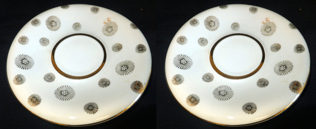 2er Set UNTERTASSEN, Porzellan, Linien Goldrand Sonne Blumenblüten Dekor